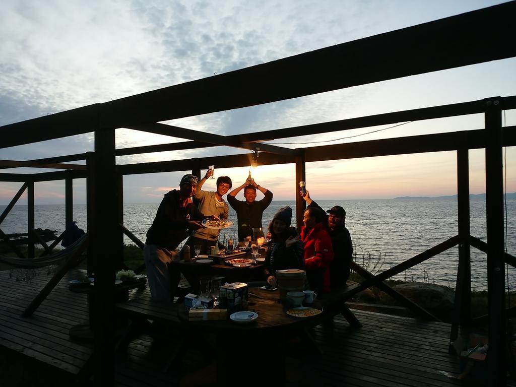 Хостел Amakusa West Coast Backpackers Fu-Raibou Экстерьер фото
